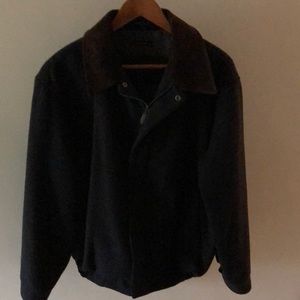 Wool jacket with leather collar.